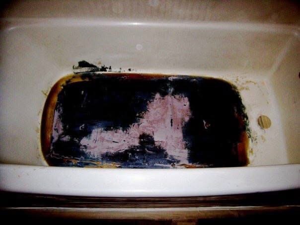 Bathtub mid-stripping process underway